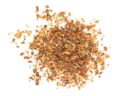 Dried smoking tobacco isolated on a white background, top view.の写真素材