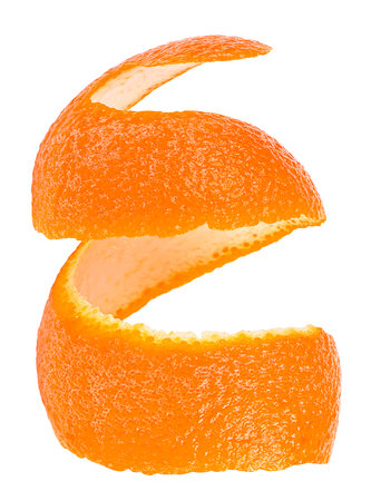 Fresh peel of orange fruit isolated on a white background. Orange twist.の写真素材