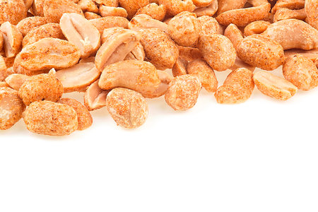 Chili spicy peanuts pile isolated on a white backgroundの写真素材