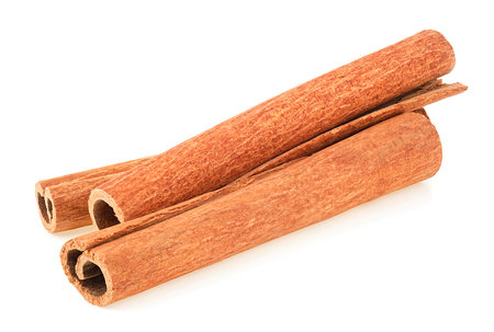 Aromatic cinnamon sticks isolated on a white background. Canella spice.の写真素材