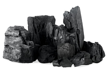 Hardwood charcoal or natural wood charcoal isolated on a white backgroundの写真素材