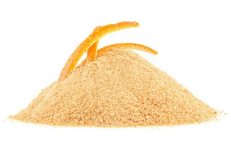 Dried orange peel powder and fresh orange peel isolated on a white backgroundの写真素材