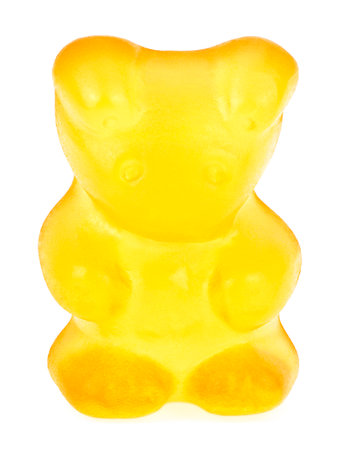Yellow gummy bear isolated on a white background. Gummy bears candies. Jelly bears candies.の写真素材