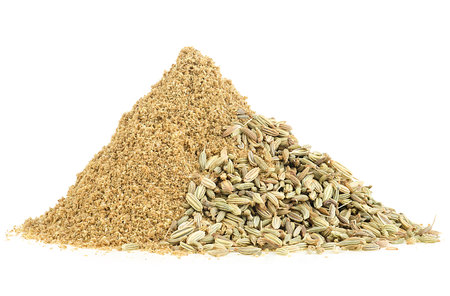 Pile of ground fennel and fennel seeds isolated on a white backgroundの写真素材