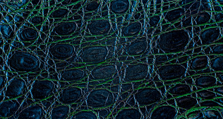 Background of colored wet crocodile leather. Texture of alligator skin.の写真素材