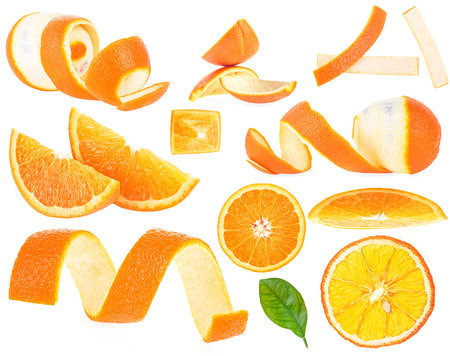 Collection of orange fruit, slices and orange peeled skin isolated on a white backgroundの写真素材