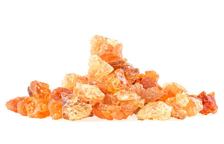 Pile of golden frankincense resin isolated on a white background. Incense. Natural frankincense Olibanum.の写真素材
