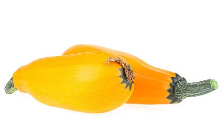 Two fresh whole zucchini isolated on a white background. Courgettes.の写真素材