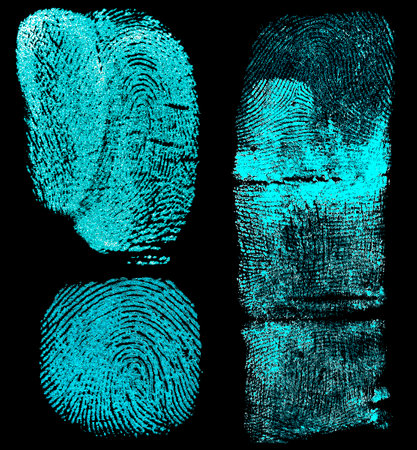 Collection of fingerprints on black background. Fingerprints with ultraviolet lamp.の写真素材