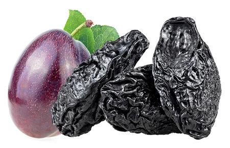 Fresh plum and prunes with green leaves isolated on a white background. Healthy food.の写真素材