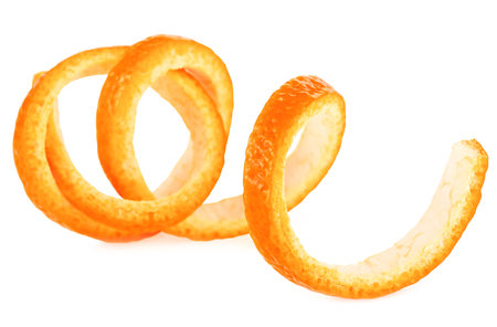 Single fresh orange peel on a white background. Vitamin C, skin health beauty concept.の写真素材