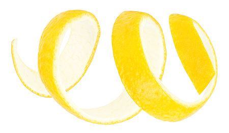 Ripe lemon twist or lemon zest isolated on a white background. Fresh citrus fruit.の写真素材