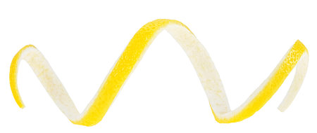 Fresh peel of lemon fruit isolated on a white background. Citrus twist skin.の写真素材