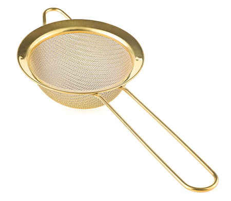 Golden colander for cooking isolated on a white background. Metal mesh. Kitchenware.の写真素材