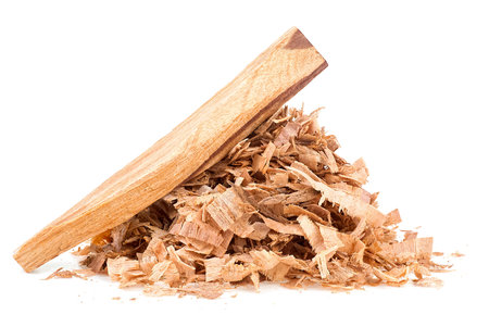 Palo santo wood stick and wooden chips isolated on a white background. Bursera Graveolens - holy wood.の写真素材