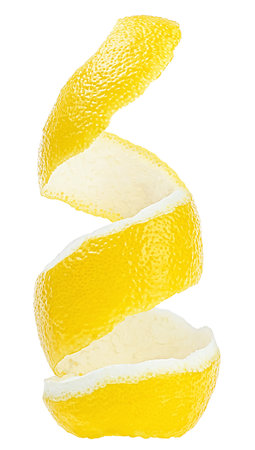 Fresh lemon skin or lemon zest isolated on a white background. Citrus twist peel, vertical image.の写真素材