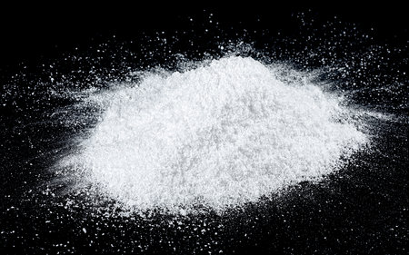Pile of white fluffy snow isolated on a black background. Long web banner.の写真素材