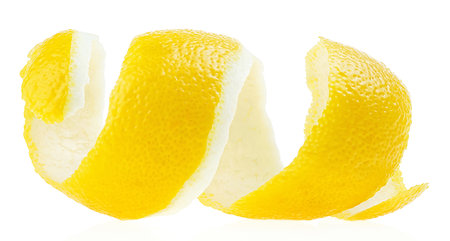 Spiral lemon peel or lemon twist isolated on a white backgroundの写真素材