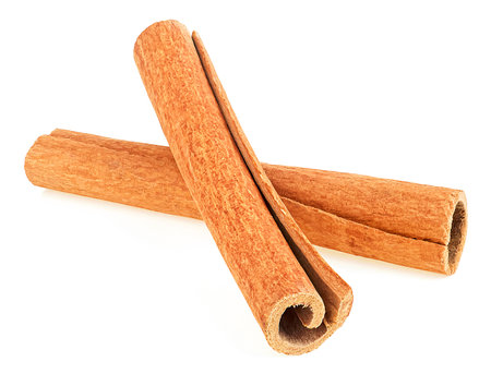 Fragrant cinnamon sticks isolated on a white background. Aromatic dry cinnamon sticks.の写真素材