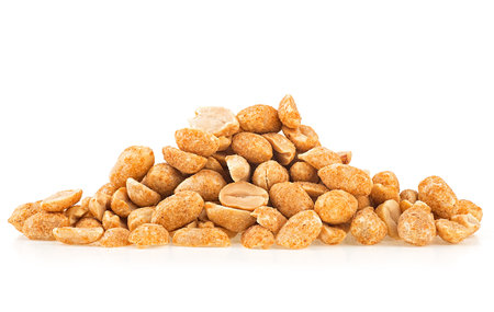 Fried and salted peanuts pile isolated on a white backgroundの写真素材