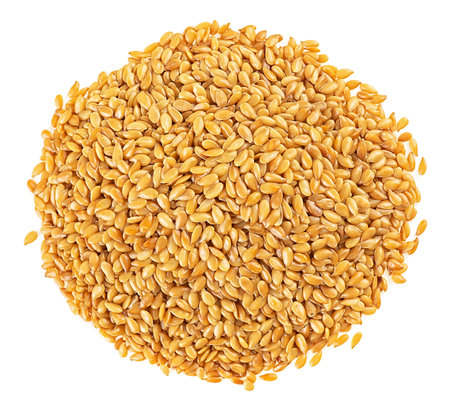 Yellow seeds of flax isolated on a white background, view from above. Golden linseeds.の写真素材