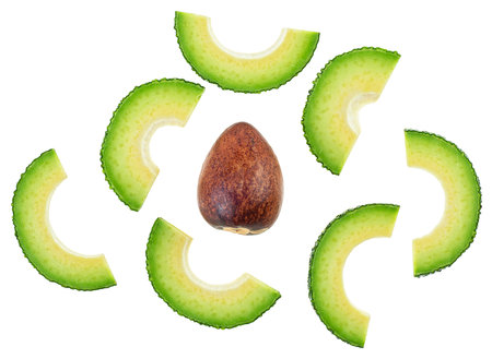 Fresh avocado, healthy food. Sliced avocado with a stone isolated on a white background, top view.の写真素材