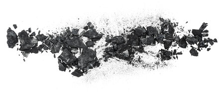 Pieces of black charcoal isolated on a white background, top view. Black coal.の写真素材