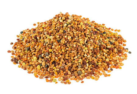 Ambrosia - pile of bee pollen or perga isolated on a white background. Healthy vegetarian food supplement. Flower pollen grains or bee bread.の写真素材