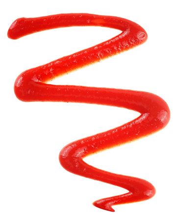 Tomato sauce isolated on a white background, top view. Splash of spicy ketchup.の写真素材