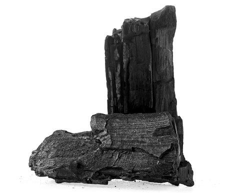 Pieces of natural wood charcoal isolated on a white background. Hard wood charcoal.の写真素材