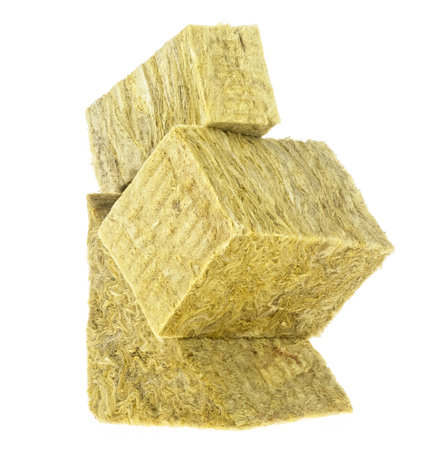 Mineral wool pieces isolated on a white background. Thermal insulation material, rock wool. Mineral fiber, mineral cotton, glass wool, MMMF, MMVF.の写真素材