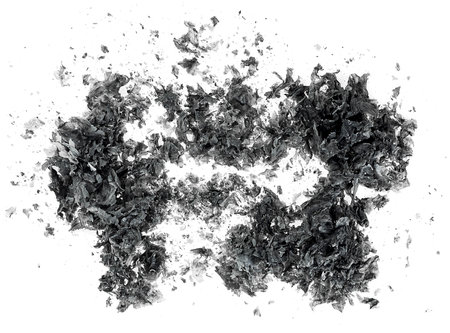 Pieces of burnt paper isolated on a white background, view from above. The ashes of the paper....