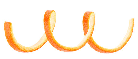 Spiraling orange peel isolated on a white background. Swirl of orange skin.の写真素材