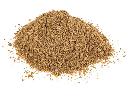 Heap of powdered coriander isolated on a white background. Ground coriander.の写真素材