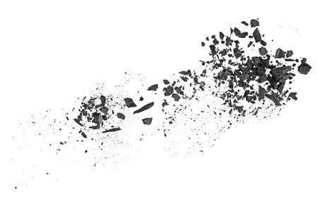 Black charcoal dust isolated on a white background, top view. Natural hardwood charcoal.の写真素材