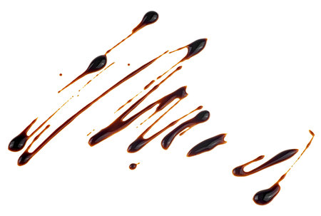 Sweet chocolate sauce isolated on a white background. Melted chocolate sauce.の写真素材