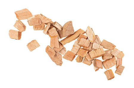 Chips for smoking meat and fish isolated on a white background, view from above.の写真素材