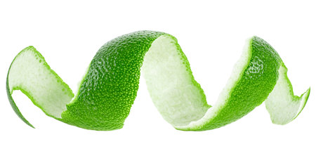Peel of fresh ripe lime isolated on a white background. Curly lime peel twist. Zest of lime.の写真素材