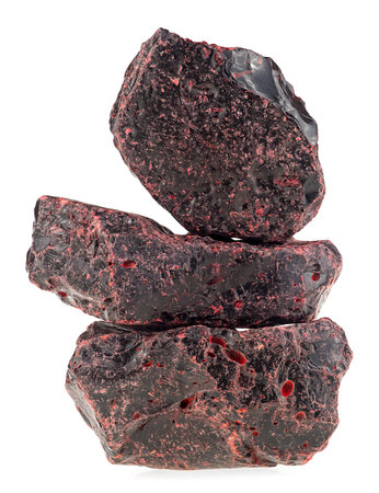 Dragons Blood - pile of red resin isolated on a white background. Alternative medicine. Croton lechleri (sangre de drago).の写真素材