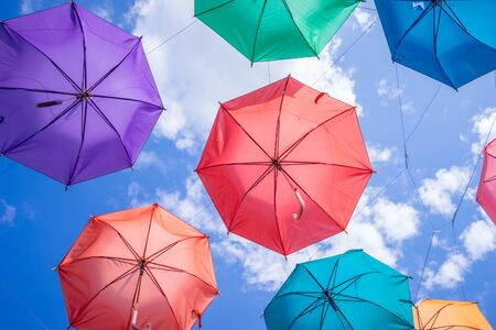 Colorful umbrellas in the sky
