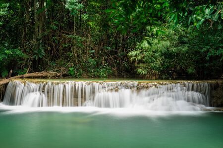 Huai Mae Khamin Waterfall at deep tropical rainforest in Srinakarin dam, national park in Thailandの写真素材