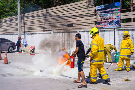 Samutprakan,Thailand - April 21, 2019 : Fire drills for people living in condominiumsのeditorial素材