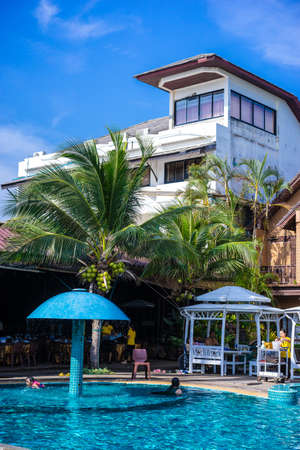 Rayong,Thailand - June 22, 2019 : Tourists playing in beautiful swimming pool in tropical resortのeditorial素材