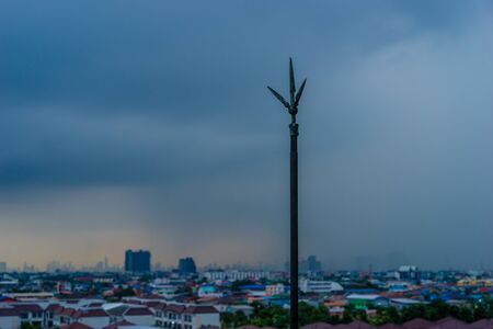 Lightning rod on the rooftop of condominium in raining day