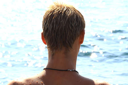 young man and the seaの写真素材