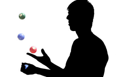 young man juggling with balls