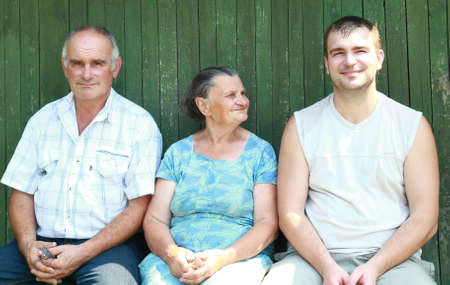 The son and grandson came to visit grandmotherの写真素材