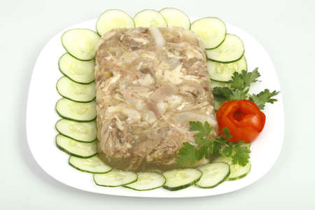 Jellied chicken decorated with cucumber and rose with tomatoの写真素材