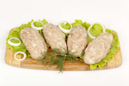 Molded-fry forcemeat kebab on a cutting boardの写真素材