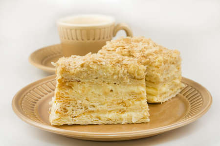 napoleon cake and cup of coffee closeupの写真素材